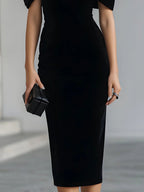 Regina | Vestido Midi Negro con Lazo Statement