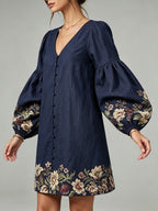 Vestido mini azul marino de algodón y lino, con escote en V y mangas farol, de estampado floral