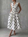 Vestido midi clásico blanco y negro de lunares con mangas francesas