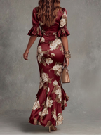 Serafina | Vestido Largo Asimétrico con Escote en V, Mangas Abullonadas Acampanadas y Estampado Floral