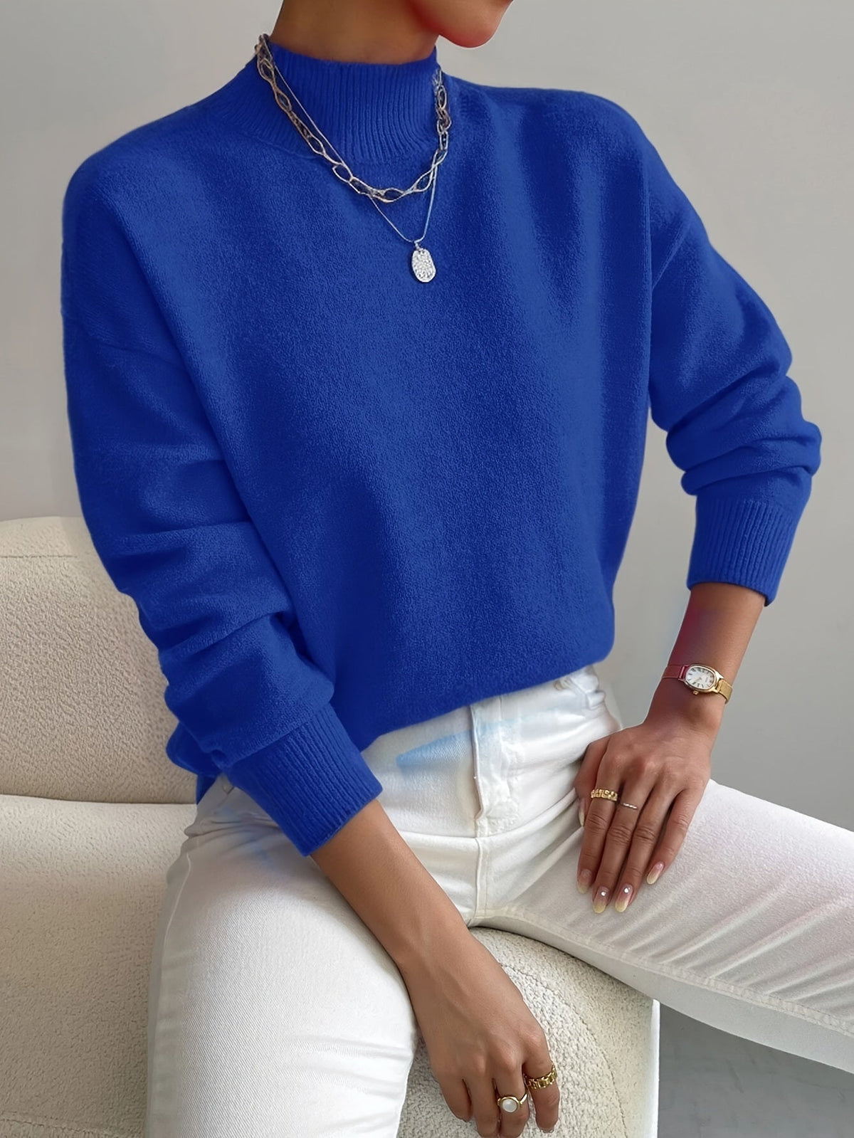 Petra | Jersey de cuello semi alto con hombros caídos