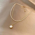 Collar de perlas lustrosas