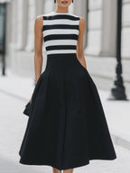 Vestido midi elegante de corte A, sin mangas, a rayas, con bolsillos