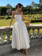 Elegante vestido de invitada de boda con corsé y escote favorecedor de fiesta | Midi