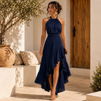 Elegante vestido de invitada de boda azul con cuello halter y bajo asimétrico de volantes
