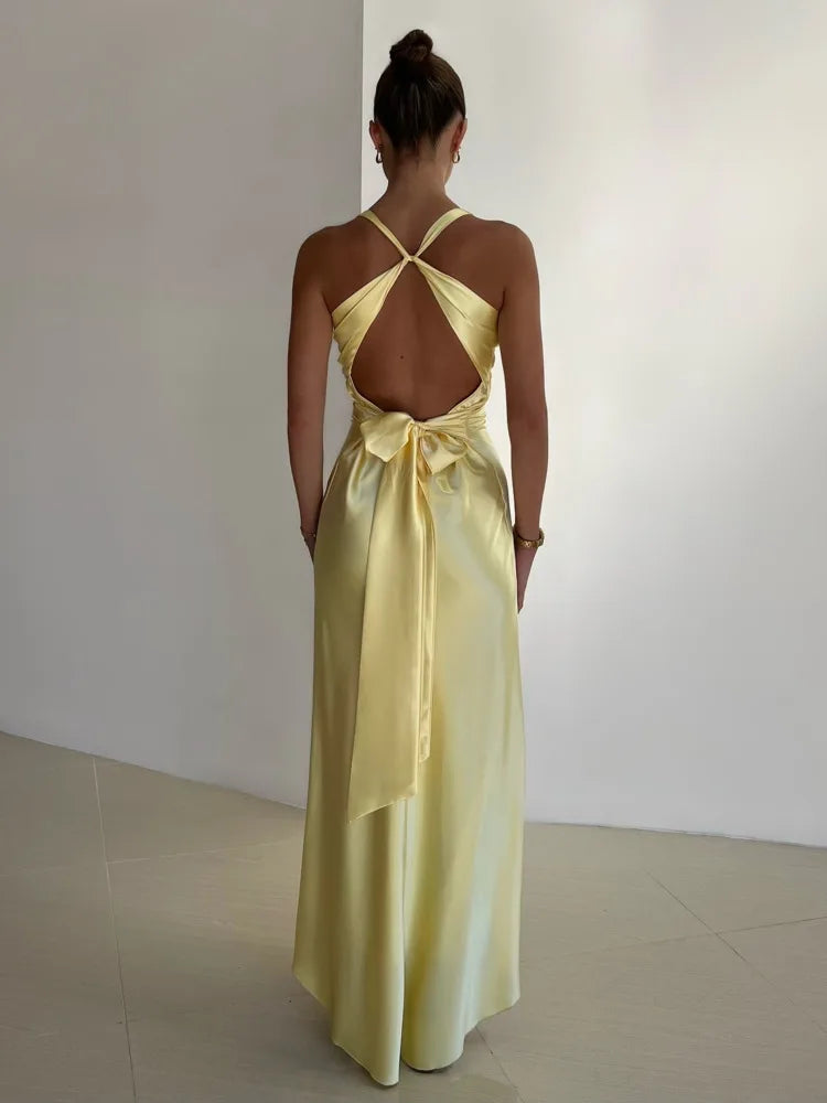 Refinado vestido largo de fiesta y de invitada de boda sin mangas con caída fluida | Maxi