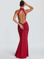 Elegante vestido largo de invitada de boda con cuello halter y espalda descubierta | Maxi