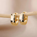 Aros Dorados Esculpidos Intemporales