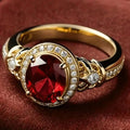 Anillo Statement de Rubí con Halo y Nudo