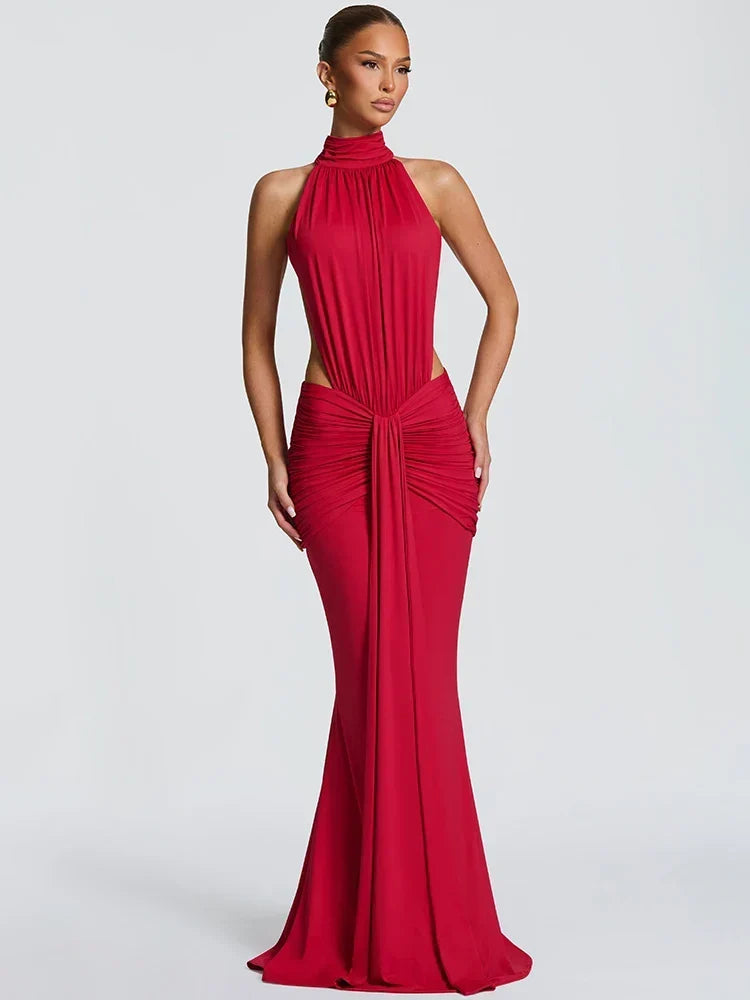 Elegante vestido largo de invitada de boda con cuello halter y espalda descubierta | Maxi
