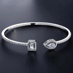 Brazalete Abierto de Oro con Dos Piedras