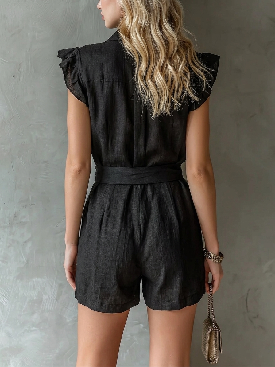 Mono negro sin mangas, con cuello y lazada delantera