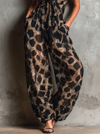 Zaira | Mono de Estampado de Leopardo con Escote en V, Tirantes Finos y Lazada en la Cintura