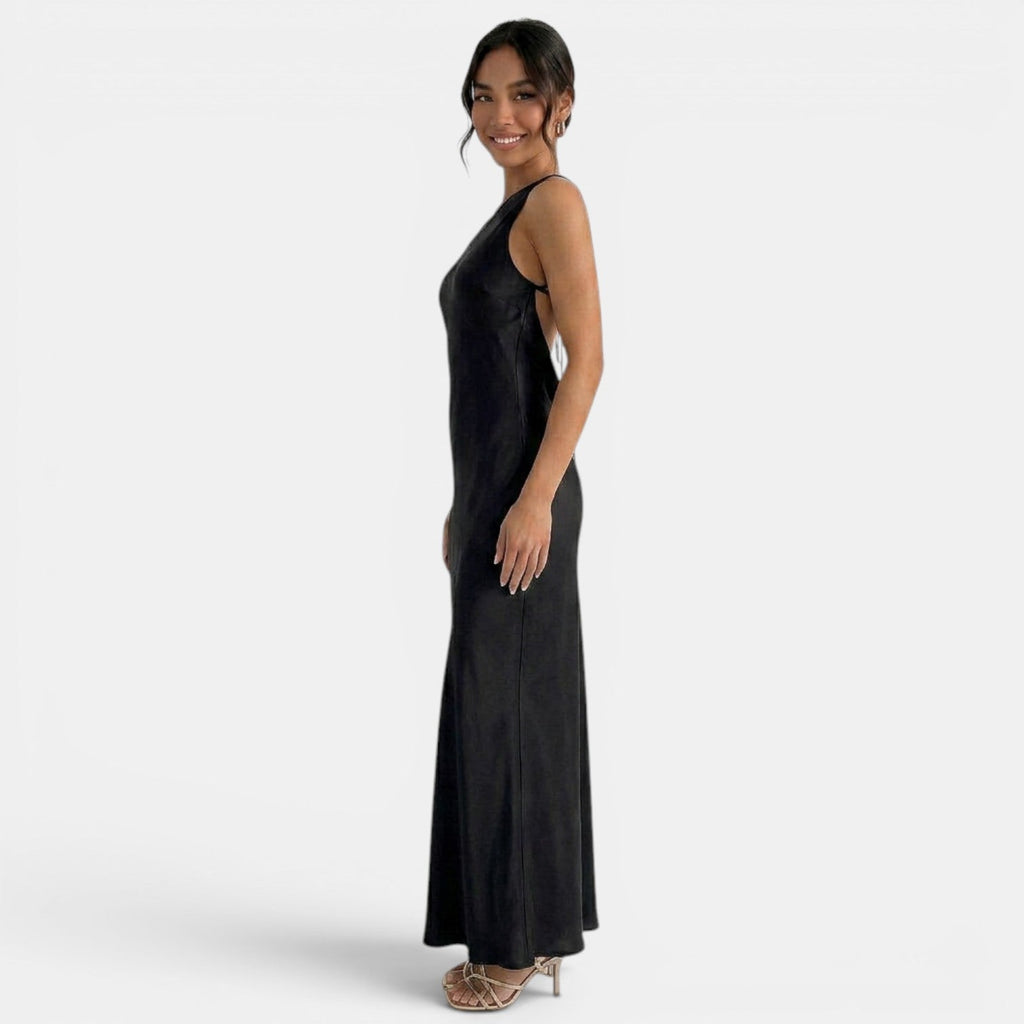 Refinado vestido largo de encaje de fiesta y de invitada de boda con espalda descubierta y cordones | Maxi