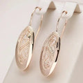 Pendientes Colgantes de Resplandor Dorado