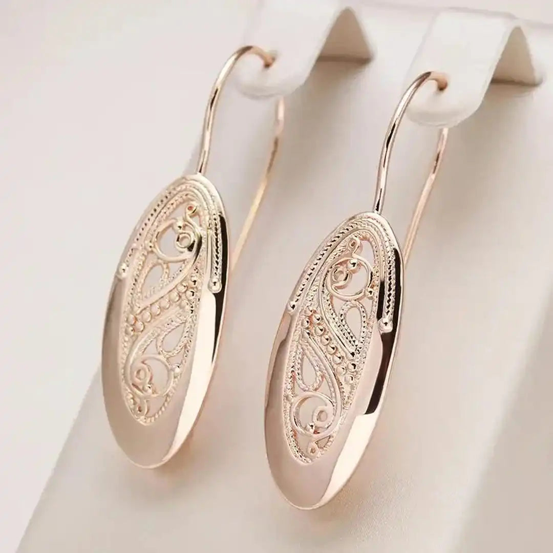 Pendientes Colgantes de Resplandor Dorado