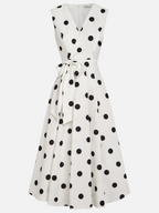 Vestido midi clásico blanco y negro de lunares con mangas francesas