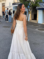 Elegante vestido largo blanco de invitada de boda y de ceremonia con tirantes finos y caída fluida | Maxi