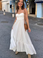 Elegante vestido largo blanco de invitada de boda y de ceremonia con tirantes finos y caída fluida | Maxi