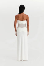 Refinado vestido largo palabra de honor de invitada de boda con transparencias y lazos | Maxi