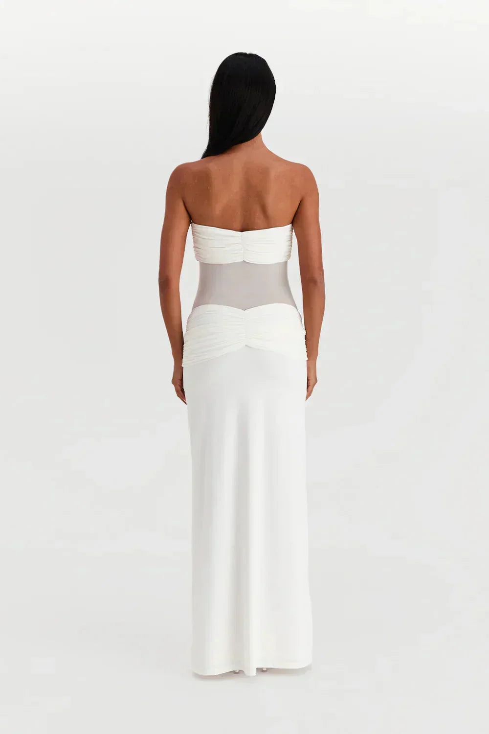 Refinado vestido largo palabra de honor de invitada de boda con transparencias y lazos | Maxi