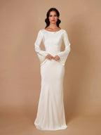 Elegante vestido largo de invitada de boda con manga larga y silueta fluida | Maxi