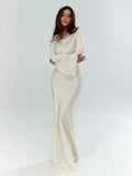 Elegante vestido largo de invitada de boda con manga larga y silueta fluida | Maxi